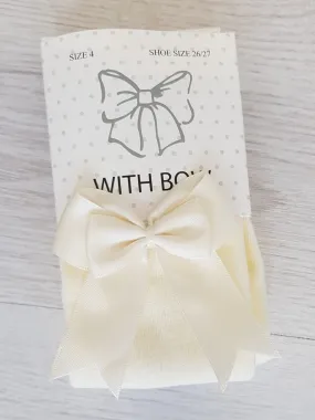 Cream bow tights